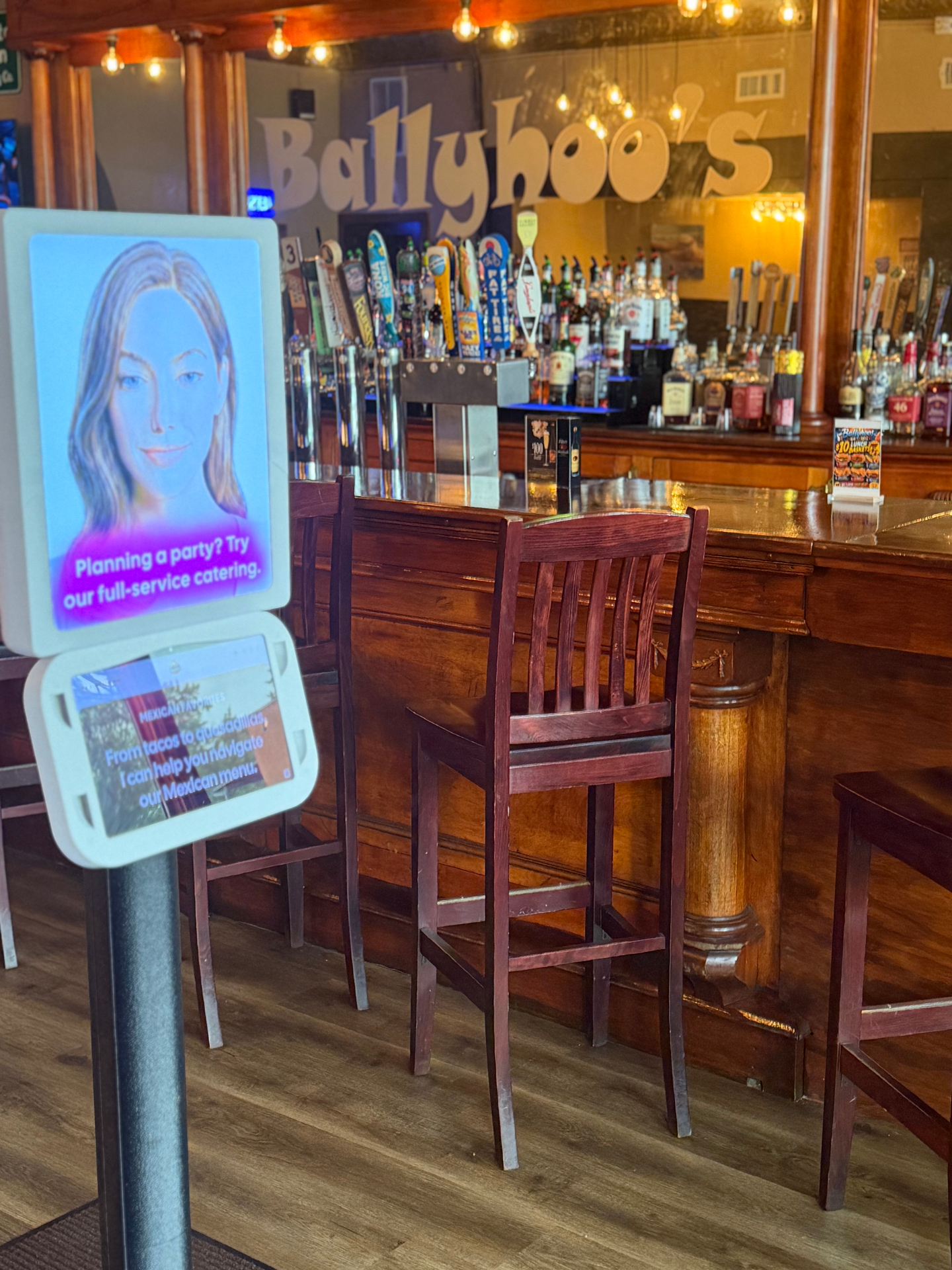 Ballyhoo's bar with rows of craft beer taps and full liquor selection